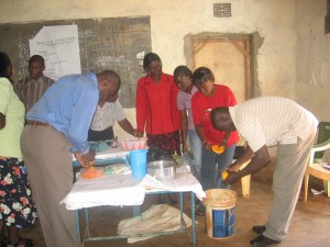 Grace during Cooking demonstration with faciliators